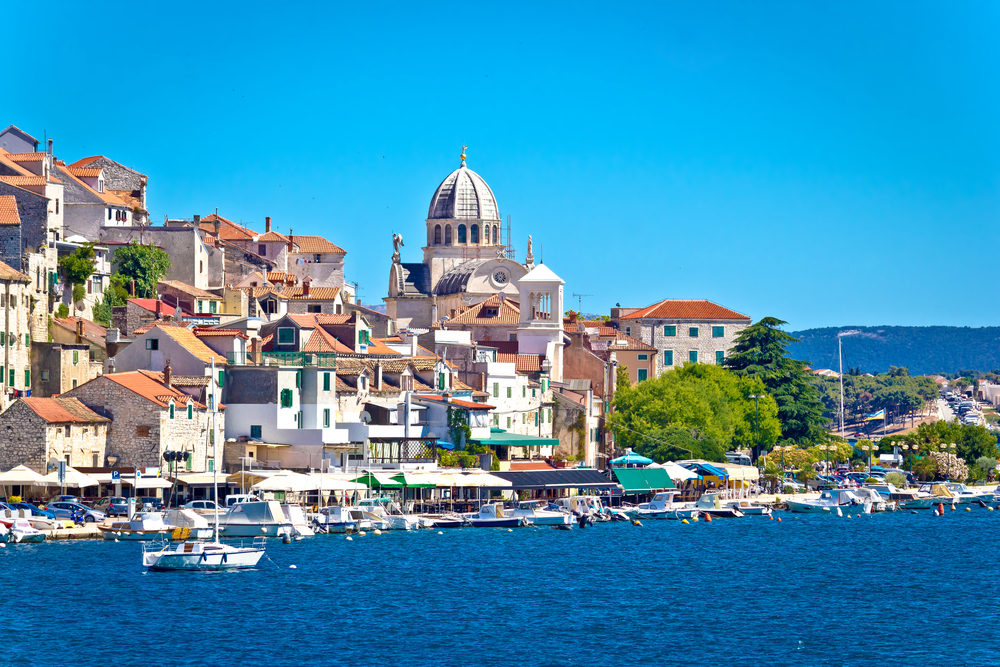 Discover Šibenik, a coastal city in Dalmatia, Croatia, known for its medieval architecture, UNESCO-listed St. James Cathedral, and stunning views of the Adriatic Sea