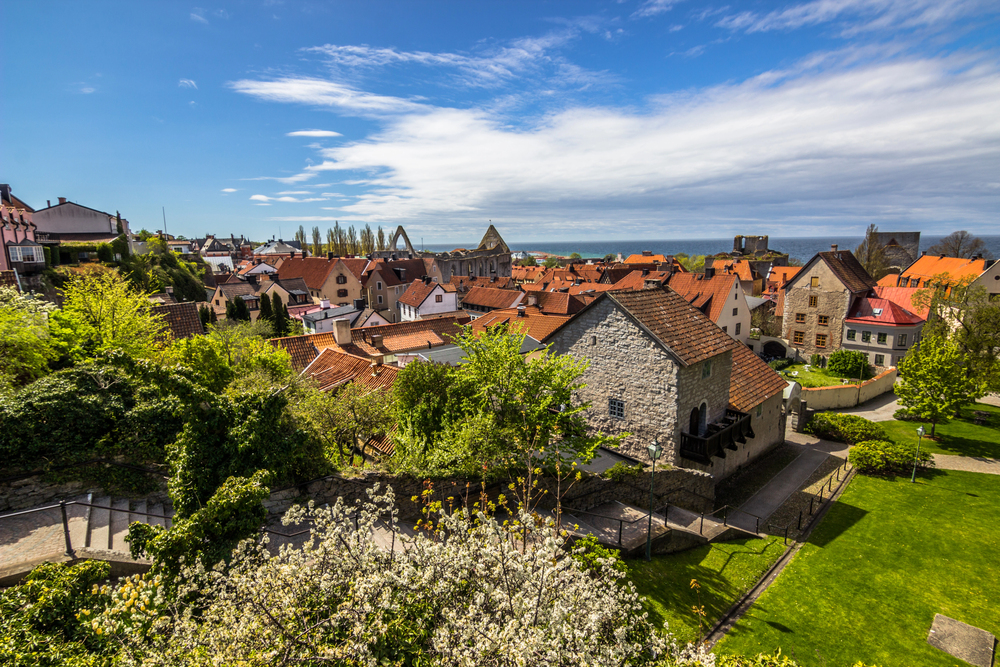 Explore Visby, a medieval city on Gotland Island, Sweden, known for its well-preserved cobblestone streets, ancient city walls, and historical landmarks, offering a glimpse into the past