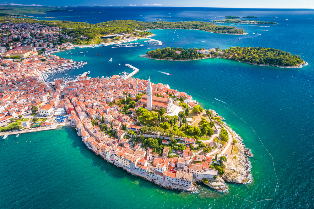 Explore Rovinj, a picturesque coastal town in Istria, Croatia, known for its charming cobblestone streets, colorful buildings, and beautiful waterfront views of the Adriatic Sea