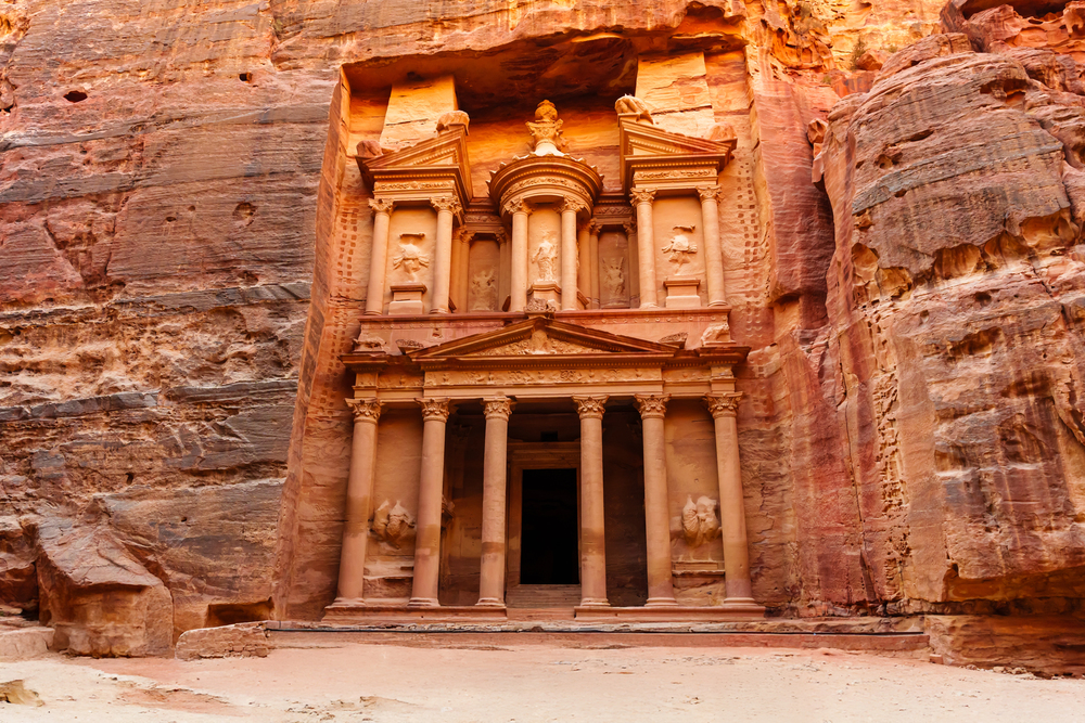 Discover Petra, the ancient rock-cut city in Jordan, known for its stunning architecture, including the Treasury and Monastery, and its rich history as a major trading hub of the ancient world