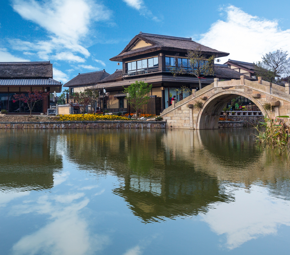 Experience a one-day tour of Gubei Water Town near Beijing, known for its beautiful architecture and scenic views