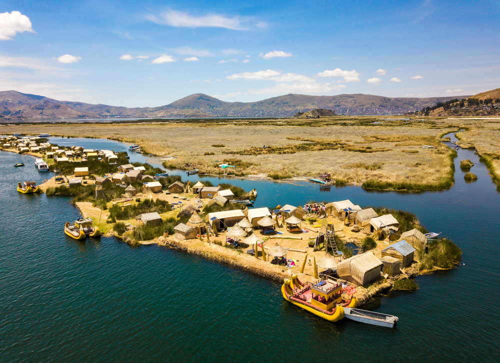 Experience a speedboat tour to Uros and Taquile Islands on Lake Titicaca, visiting traditional cultures and scenic landscapes