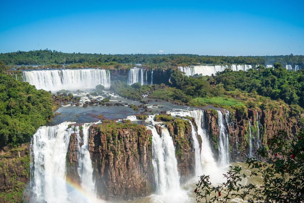 Experience a private, full-day tour of both sides of Iguazu Falls and explore its breathtaking beauty