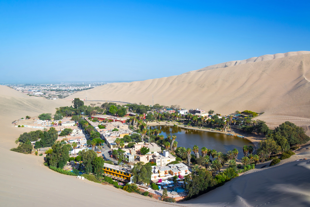 Explore the Nazca Lines and Huacachina Oasis with a thrilling dune buggy ride, experiencing Peru's unique desert landscapes and ancient wonders up close