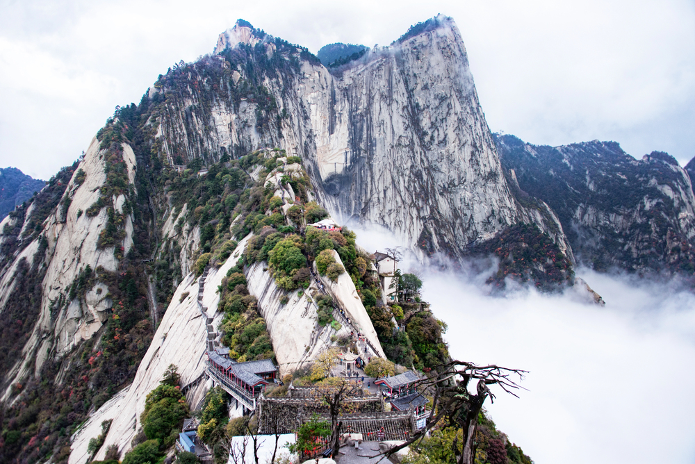 Embark on a private adventure to Xi'an's Huashan Mountain, known for its breathtaking views and challenging hikes